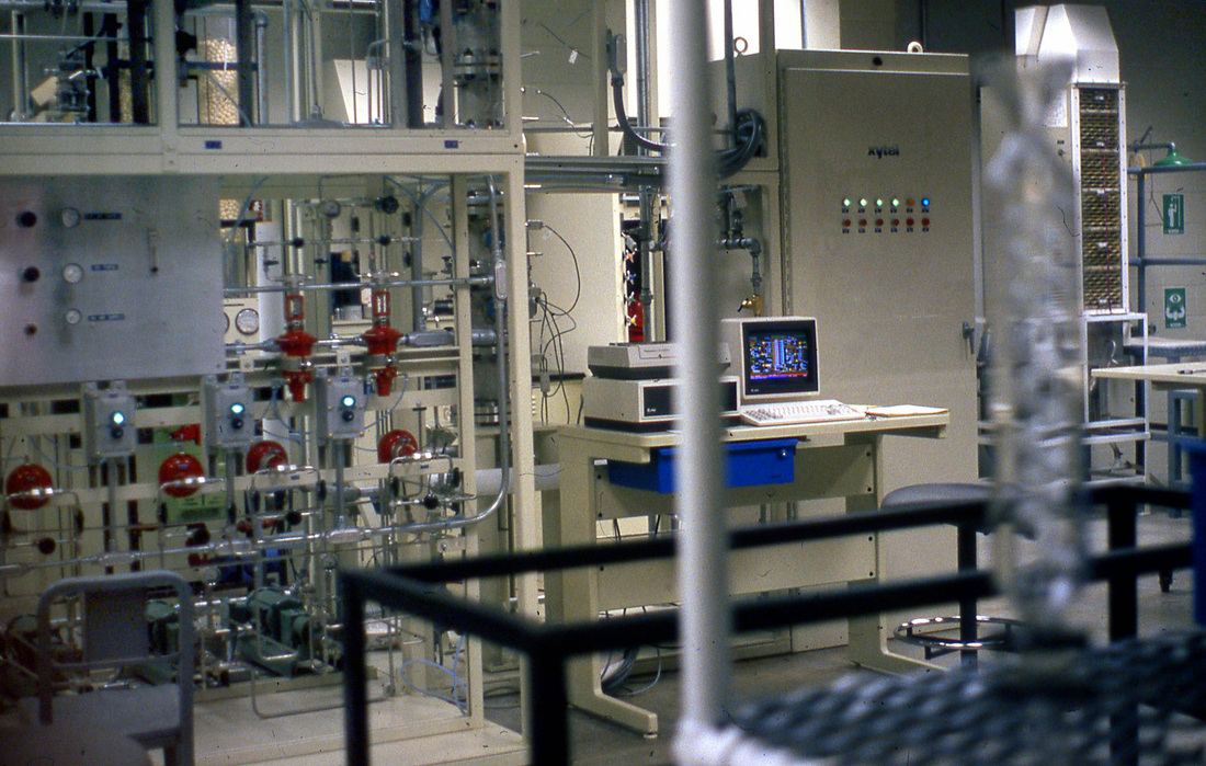 Image of factory with computer screens